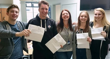Students at Abbeywood Community School in Stoke Gifford, Bristol receive their A-level results.