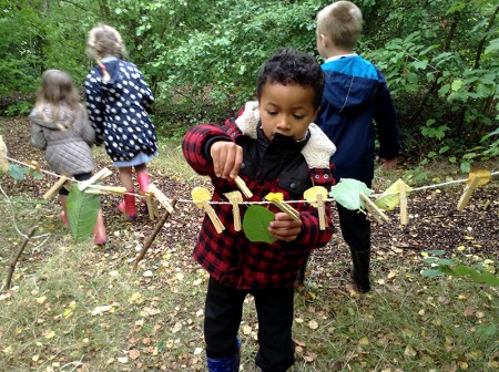 Collecting leaves at Little Stoke Primary's Forest School.