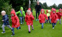 Jim Plunkett-Cole (a.k.a Jim Gump) running with children from Stoke Gifford Pre-School.