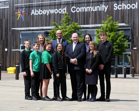 Photo of Mayor Tim Bowles with a group of students and teachers outside Abbeywood Community School.