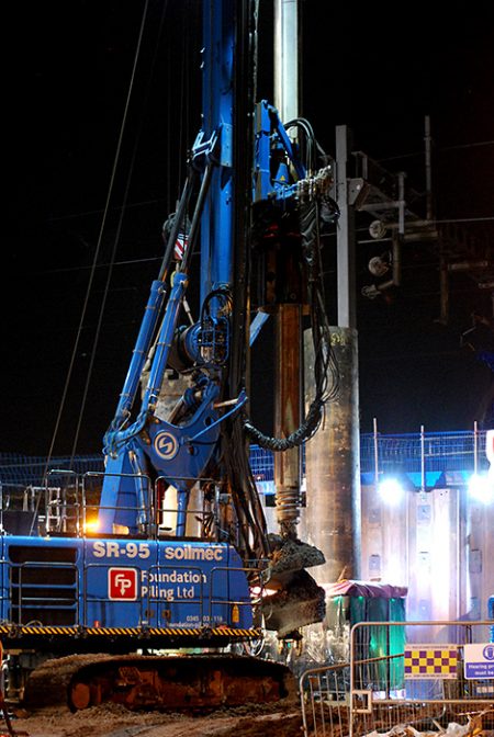 Photo of night-time piling work at the bridge.