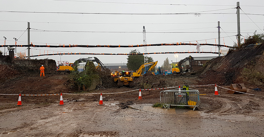 Photo showing bridge site the morning after the old bridge had been demolished.