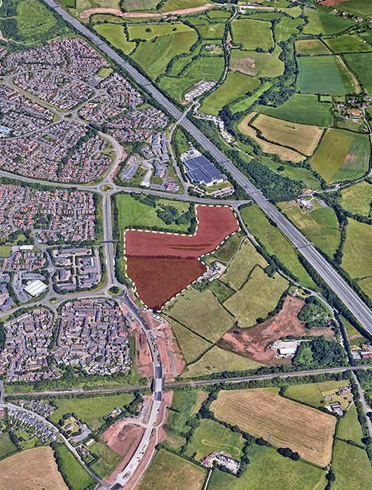 Aerial view showing outline of Wainhomes' land.