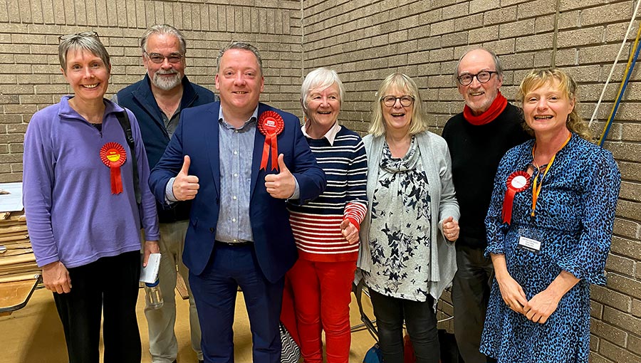 Photo of a group of Labour supporters at an election count.