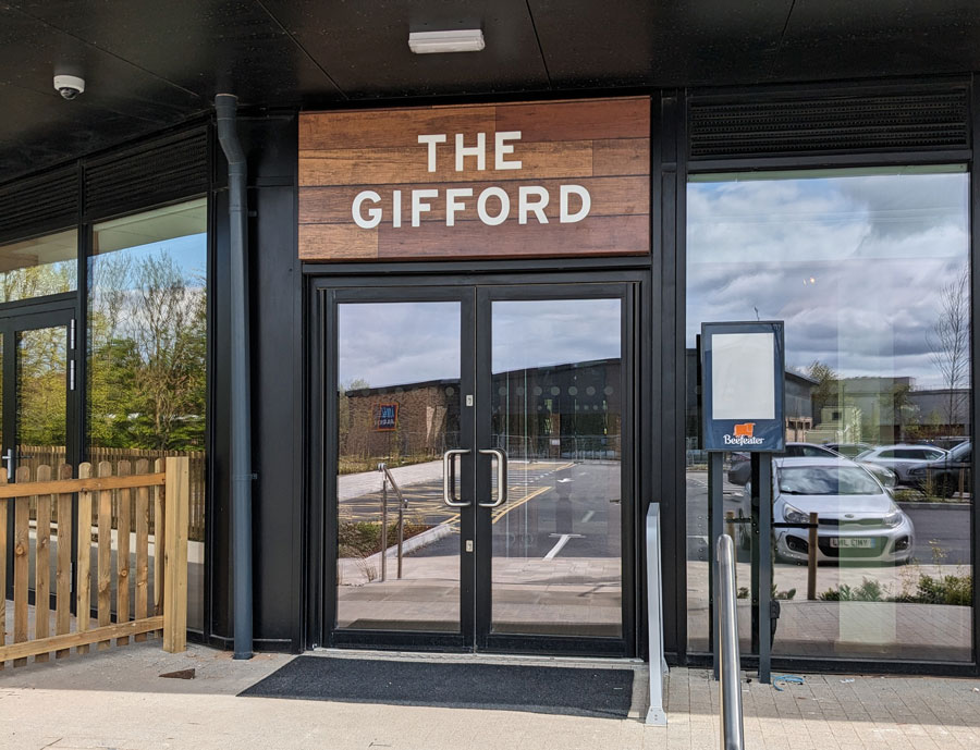 Photo of the entrance to a restaurant with 'The Gifford' over the door.